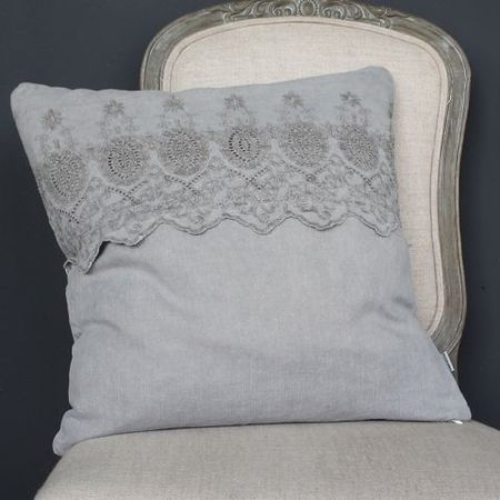 Grey linen cushion with embroidered band