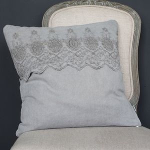 Grey linen cushion with embroidered band Grey linen cushion with embroidered band